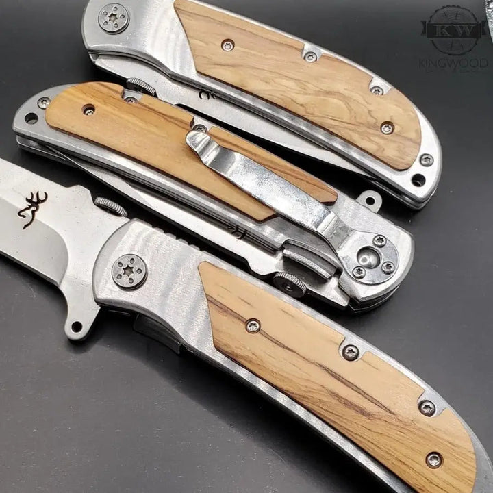 Custom laser engraved pocket tool featuring three folding knives with wooden handles