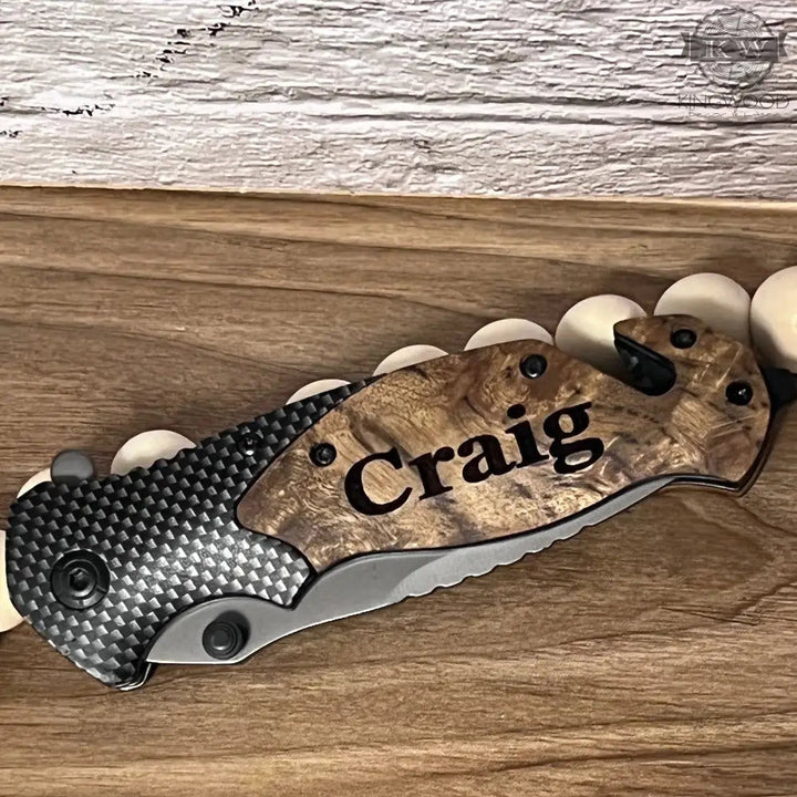 Personalized folding pocket tool with wooden handle and stainless steel blade showcasing a pocket tool