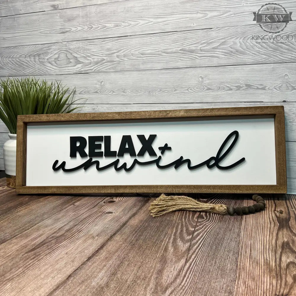 Framed Relax and Unwind farmhouse sign with rustic wood frame for home decor