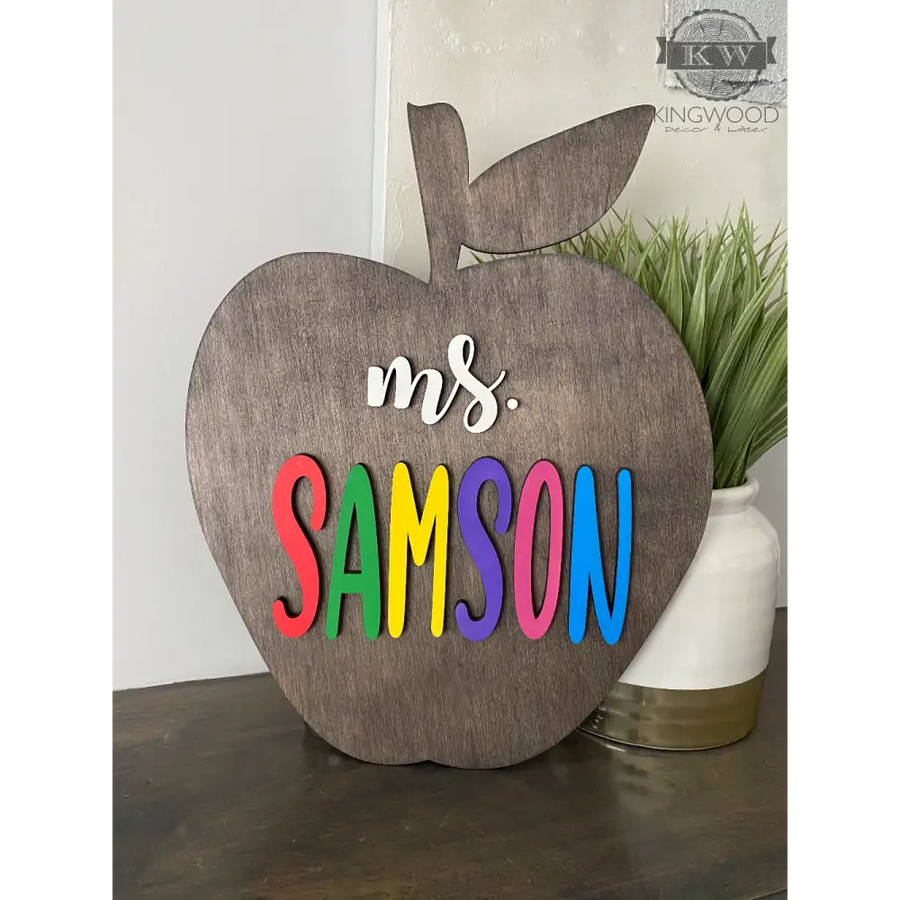 Wooden Apple teacher sign with laser-cut letters, ideal for decor and cutting boards