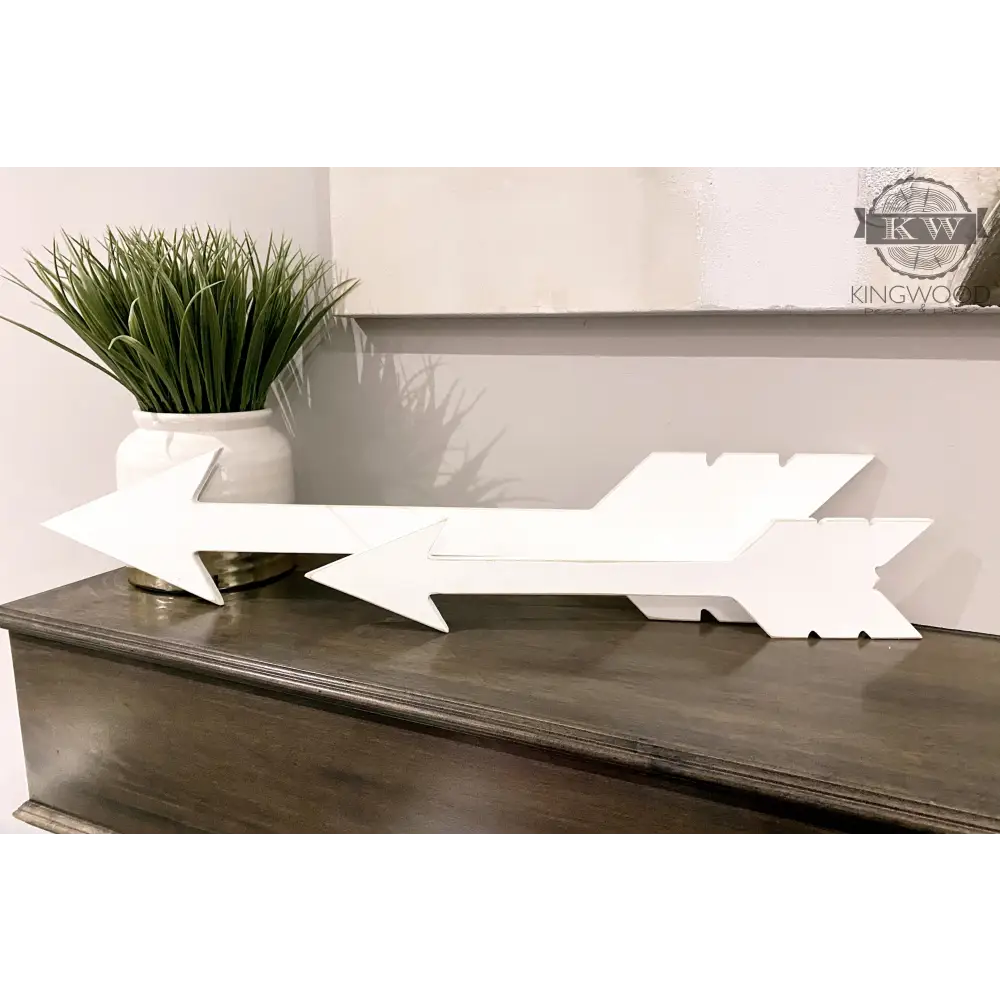 White wooden rustic arrow decor displayed in various sizes, ideal for rustic home accents