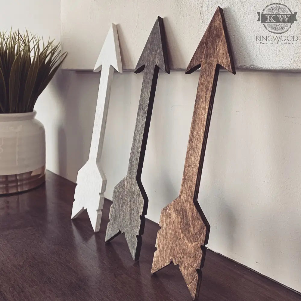 Rustic arrow decor and cutting boards displayed in multiple sizes for stylish home decor